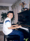 Ron at his piano at home